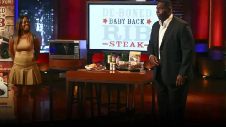 Al ‘Bubba’ Baker and Brittani Bo Baker pitching Bubba’s Q BBQ boneless ribs on Shark Tank, with a product display and branding behind them.