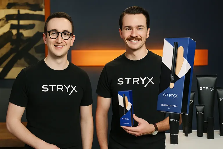 Stryx co-founders Jon Shanahan and Devir Kahan holding concealer tool and skincare products