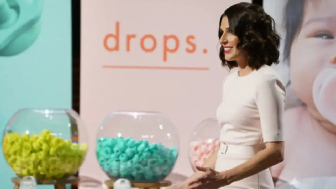 Nicki Radzely presenting The Pop pacifier with colorful product bowls and branding during her Shark Tank pitch