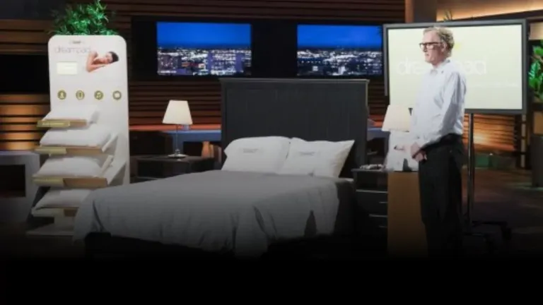 Dreampad founder presenting intrasound sleep pillow on Shark Tank with bed and product display in background