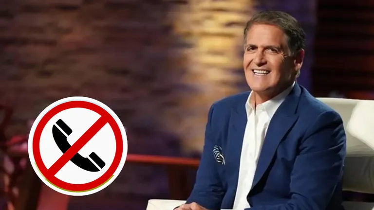 Mark Cuban smiling on Shark Tank set with no phone calls symbol, highlighting his $100M investment strategy through cold emails.