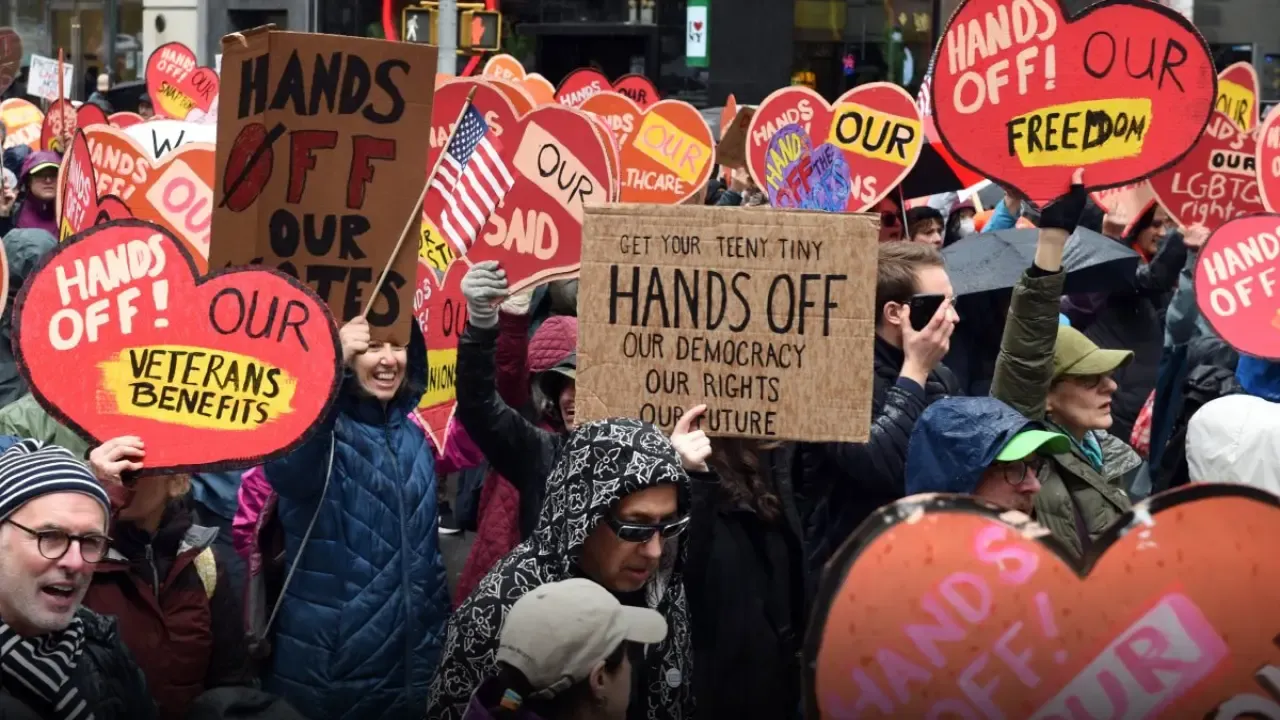 "Where's Gen Z?" she asked, microphone in hand, scanning the crowd. The "Hands Off!" protest had taken over New York City streets, but something felt off.