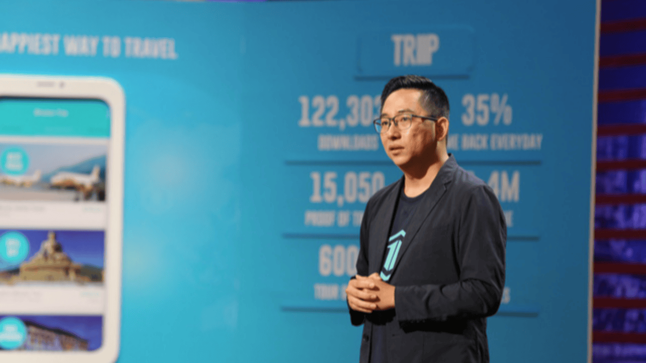 Hai Ho pitching Triip, a blockchain-based travel startup, on Shark Tank Vietnam stage